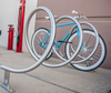 Estante de bicicleta de soporte de ciclo de metal de acero inoxidable en forma de espiral para estacionamiento